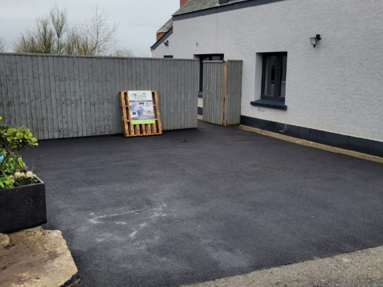 Sandstone terrace and stone walling at an oak framed extension